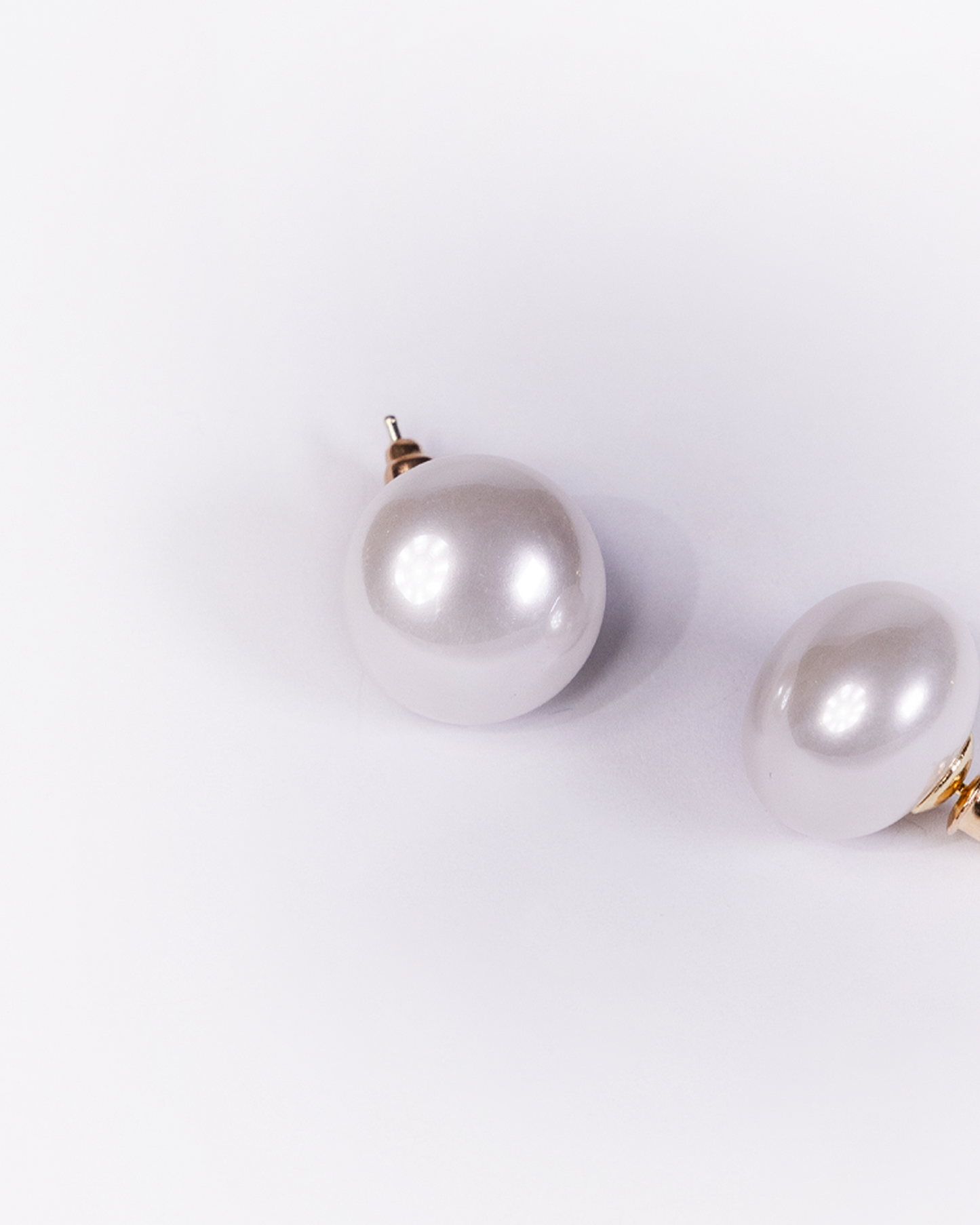 White pearl stud earrings