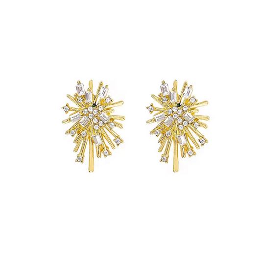 The Gold Firework earrings feature radiating gold and silver spikes with small clear gemstones, creating a symmetrical and sparkling design.