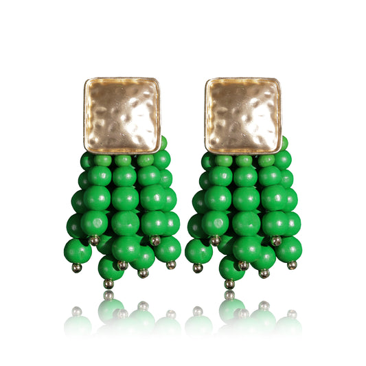The Beady Green and Gold Earrings feature hammered gold-plated square tops with multiple strands of round, bright green beads—perfect summer jewelry, shown on a white background.