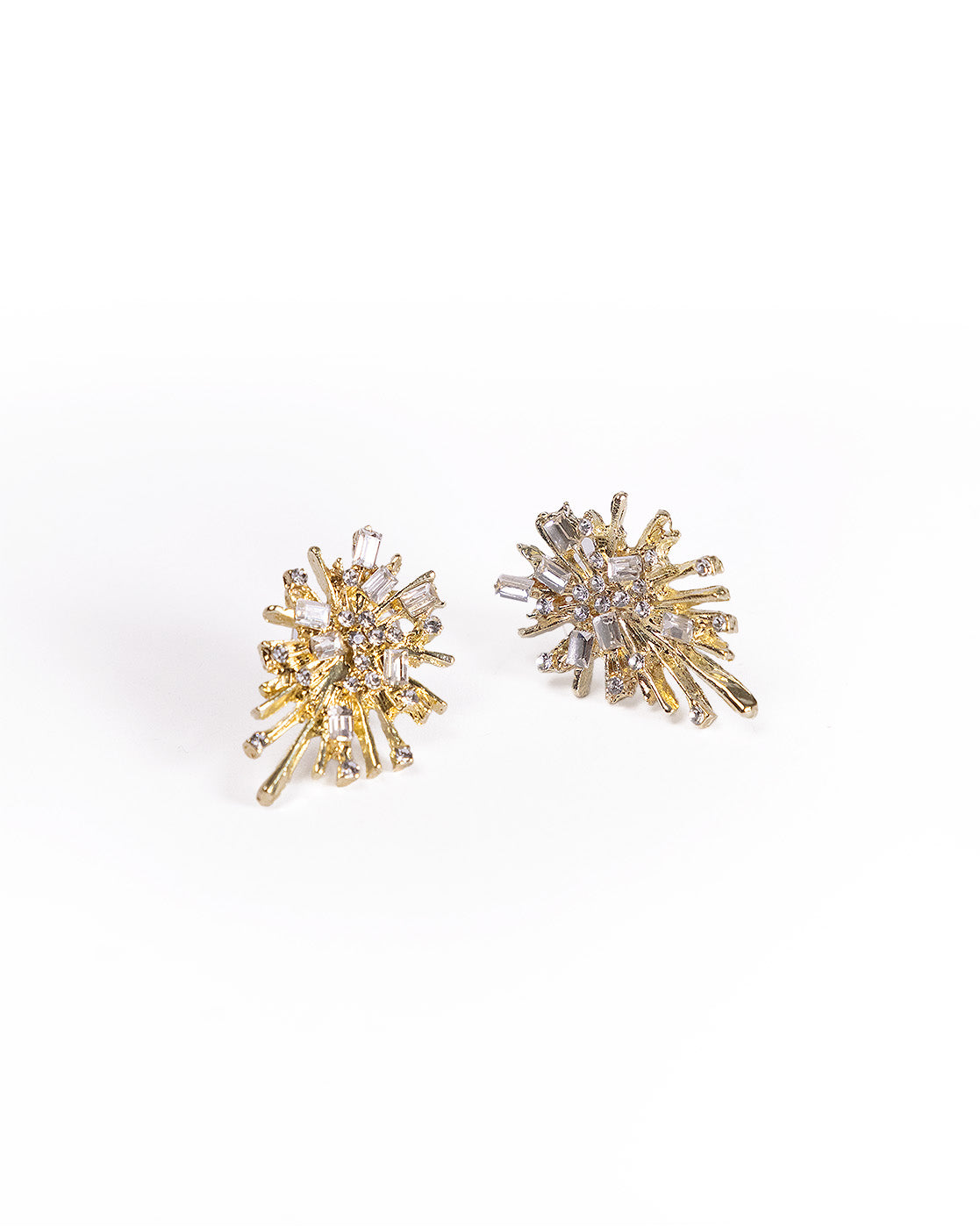 The Gold Firework earrings are 24K gold plated with a starburst design, featuring multiple radiating spokes adorned with small sparkling crystals, displayed on a white background.