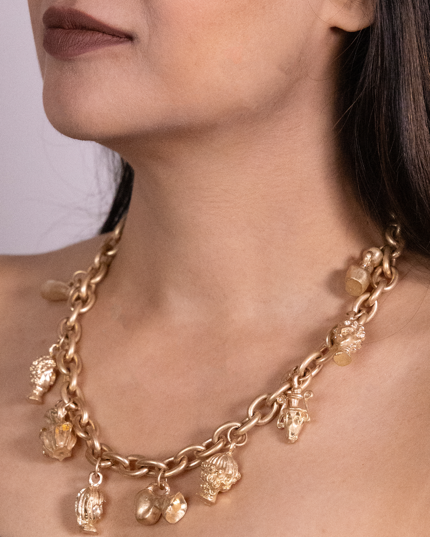 Greek Faces gold polish necklace