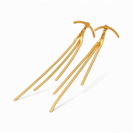 Tassel no Tassel Earrings: Modern 24K gold plated earrings with a sleek curved bar top and three slim, wavy strands hanging from each, shown on a white background.