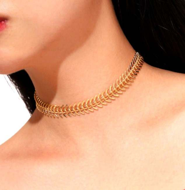 Gold choker on model